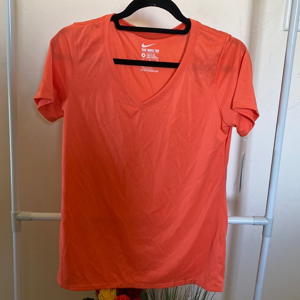 orange nike dri fit shirt